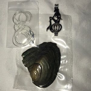 Sitting mermaid pearl cage with chain and oyster